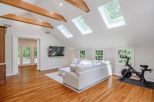20 Copper Beech Ln, Ridgefield, CT 06877 - living room with a skylight, light wood-style floors, healthy amount of natural light, and recessed lighting