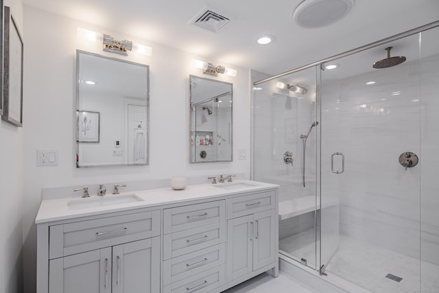 20 Copper Beech Ln, Ridgefield, CT 06877 - bathroom with a shower stall, double vanity, and recessed lighting