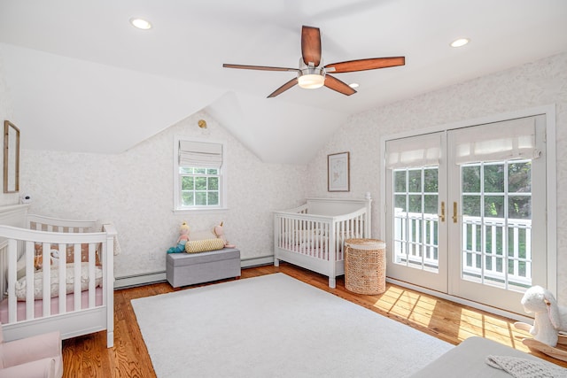 20 Copper Beech Ln, Ridgefield, CT 06877 - bedroom featuring baseboard heating, wood finished floors, lofted ceiling, recessed lighting, and ceiling fan