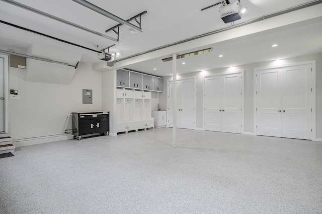 20 Copper Beech Ln, Ridgefield, CT 06877 - garage with a garage door opener, electric panel, recessed lighting, and baseboards