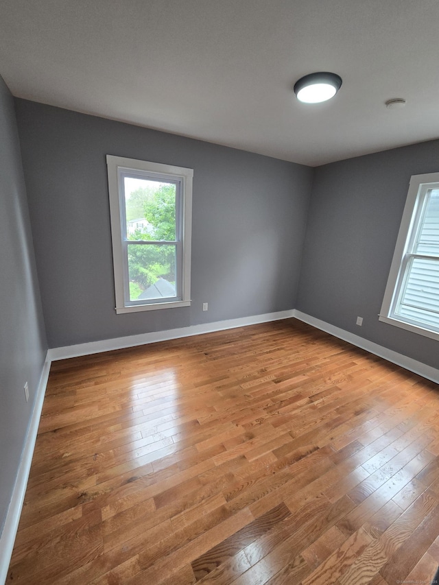 167 W St, New Haven, CT 06519 - empty room with hardwood / wood-style floors and baseboards