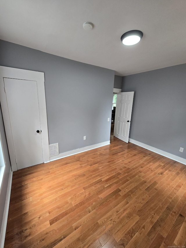 167 W St, New Haven, CT 06519 - spare room with wood finished floors and baseboards
