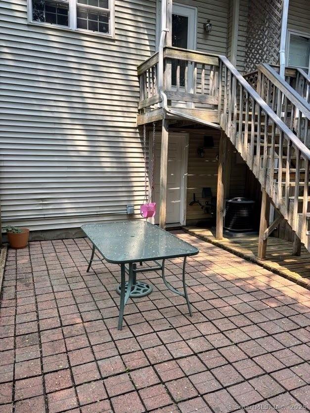 41 High St Apt 2, East Haven, CT 06512 - view of patio / terrace with stairs and cooling unit