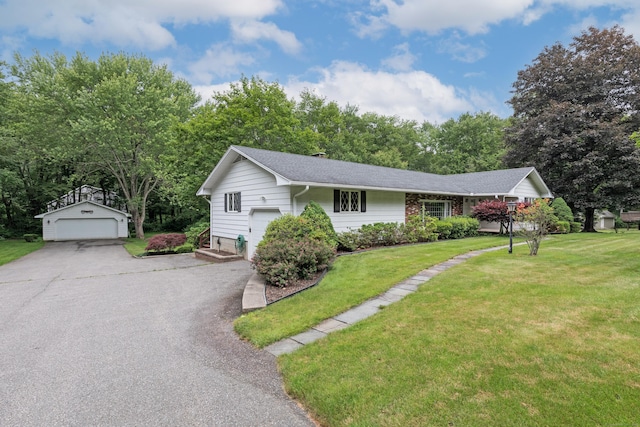 190 Allerton Farms Rd, Middlebury, CT 06762 - ranch-style home featuring an outbuilding, a front yard, a garage, and roof with shingles