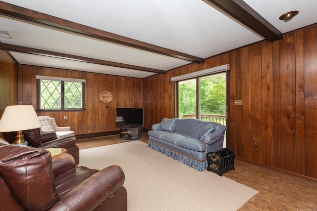 190 Allerton Farms Rd, Middlebury, CT 06762 - living room featuring beam ceiling, wood walls, and baseboards