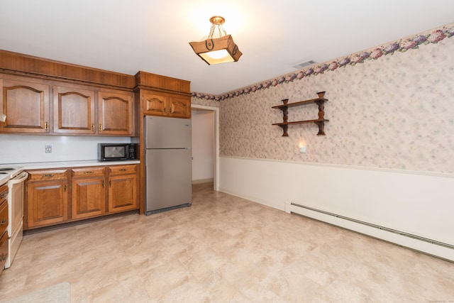 190 Allerton Farms Rd, Middlebury, CT 06762 - kitchen featuring freestanding refrigerator, baseboard heating, black microwave, light countertops, and wallpapered walls