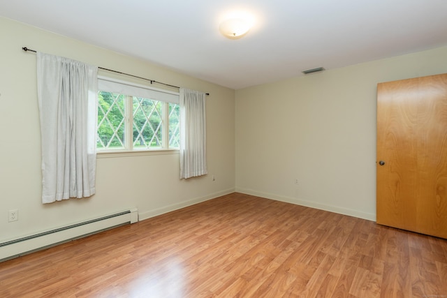 190 Allerton Farms Rd, Middlebury, CT 06762 - empty room with light wood-style flooring, a baseboard heating unit, and baseboards