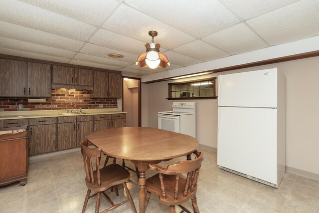 190 Allerton Farms Rd, Middlebury, CT 06762 - dining room with a paneled ceiling, baseboards, and light flooring
