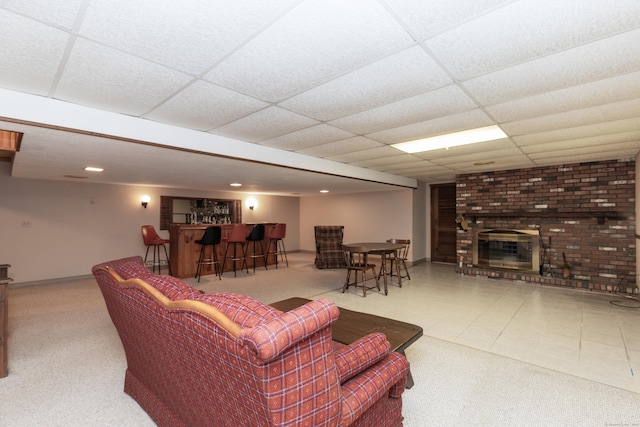 190 Allerton Farms Rd, Middlebury, CT 06762 - carpeted living area featuring bar, a fireplace, a drop ceiling, and baseboards