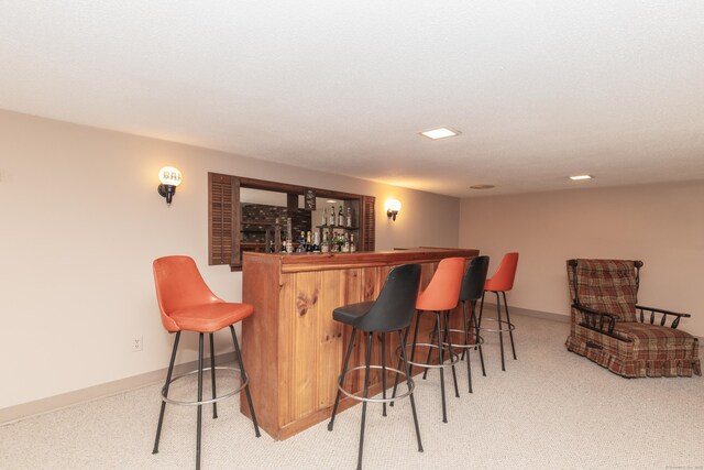 190 Allerton Farms Rd, Middlebury, CT 06762 - indoor dry bar with light colored carpet and baseboards