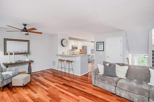 2006 Hancock Dr Unit 2006, Danbury, CT 06811 - living area featuring light wood-type flooring and a ceiling fan