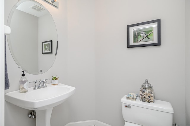 2006 Hancock Dr Unit 2006, Danbury, CT 06811 - half bathroom with toilet and baseboards