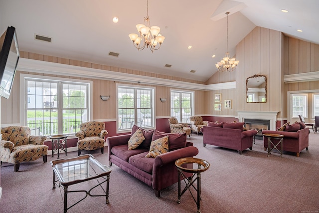 2006 Hancock Dr Unit 2006, Danbury, CT 06811 - carpeted living area with a chandelier, a glass covered fireplace, and high vaulted ceiling
