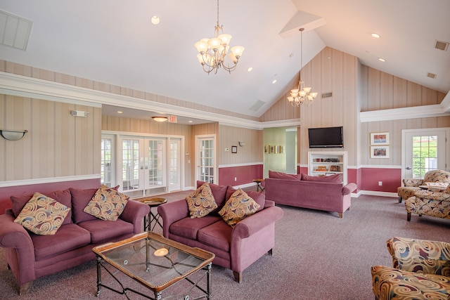 2006 Hancock Dr Unit 2006, Danbury, CT 06811 - carpeted living room featuring a chandelier, high vaulted ceiling, french doors, recessed lighting, and wooden walls
