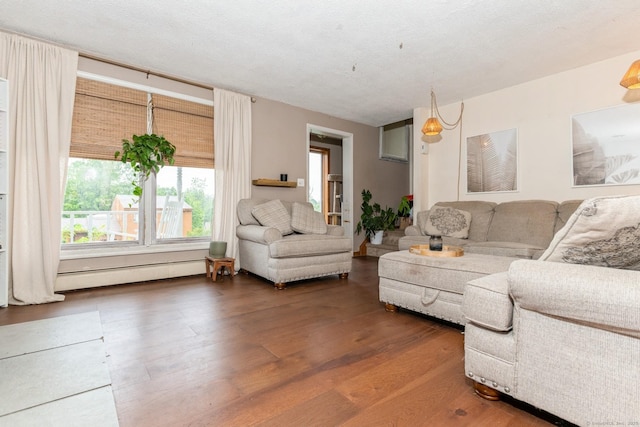 128 Santa Maria Dr, Torrington, CT 06790 - living area with wood finished floors and baseboard heating
