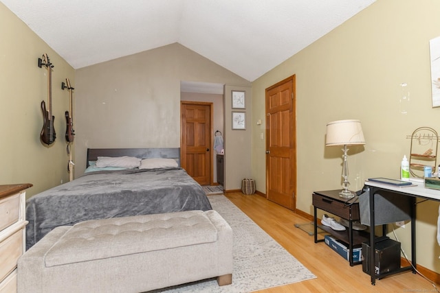 128 Santa Maria Dr, Torrington, CT 06790 - bedroom with light wood finished floors and vaulted ceiling