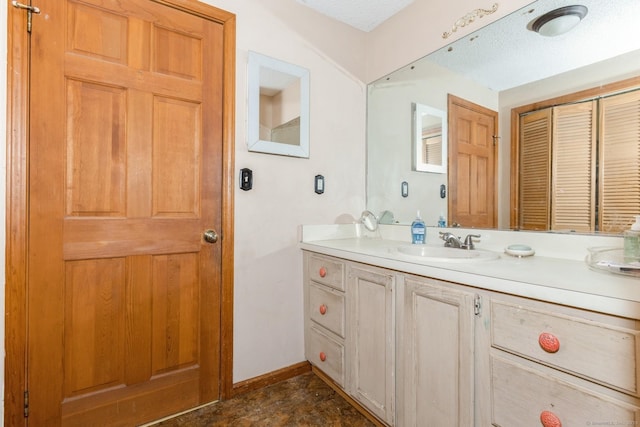 128 Santa Maria Dr, Torrington, CT 06790 - bathroom featuring vanity and baseboards