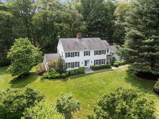 75 Bald Hill Rd, Wilton, CT 06897 - view of front of property with a chimney, a front yard, and roof with shingles