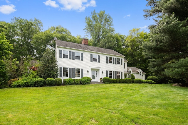 75 Bald Hill Rd, Wilton, CT 06897 - colonial inspired home featuring a chimney, a front lawn, and a shingled roof
