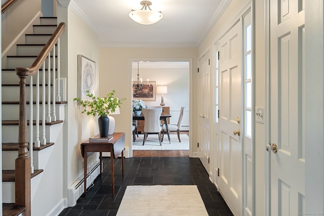 75 Bald Hill Rd, Wilton, CT 06897 - entrance foyer with stone tile floors, stairway, a baseboard radiator, crown molding, and a chandelier