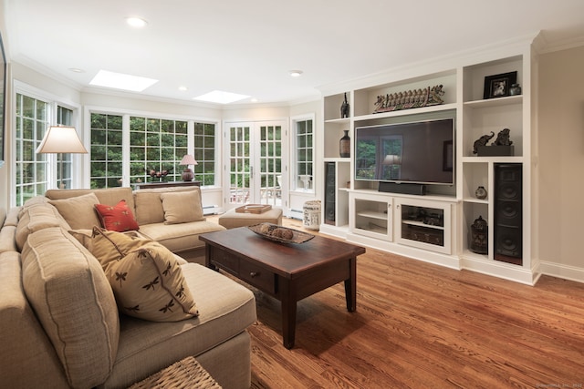 75 Bald Hill Rd, Wilton, CT 06897 - living area featuring a skylight, ornamental molding, wood finished floors, a baseboard radiator, and recessed lighting