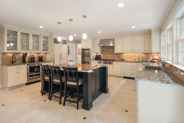75 Bald Hill Rd, Wilton, CT 06897 - kitchen with beverage cooler, stainless steel appliances, backsplash, a kitchen island, and wall chimney exhaust hood