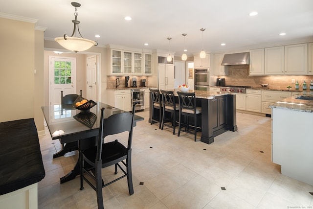 75 Bald Hill Rd, Wilton, CT 06897 - dining space with wine cooler, crown molding, and recessed lighting