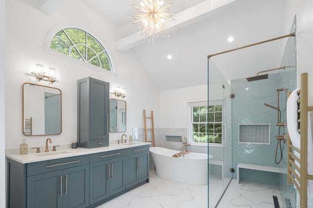 75 Bald Hill Rd, Wilton, CT 06897 - full bathroom featuring plenty of natural light, walk in shower, a freestanding tub, double vanity, and high vaulted ceiling