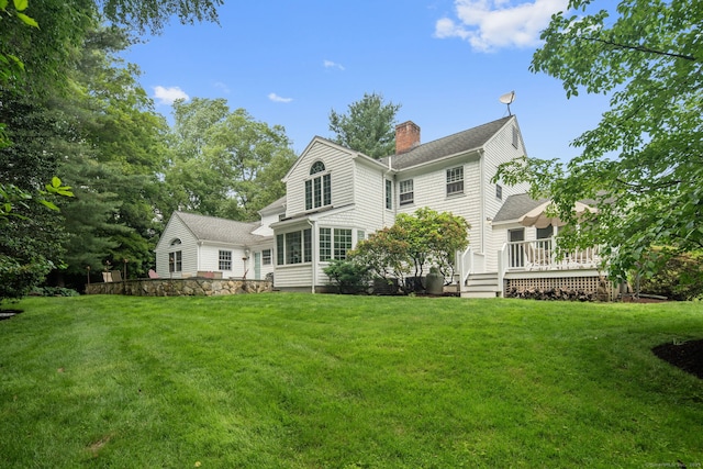 75 Bald Hill Rd, Wilton, CT 06897 - back of house featuring a chimney, a lawn, and a wooden deck