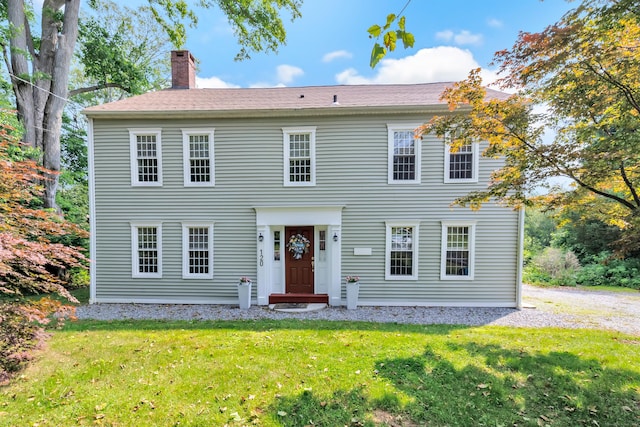 120 Huntington St, Shelton, CT 06484 - colonial inspired home featuring a chimney and a front yard