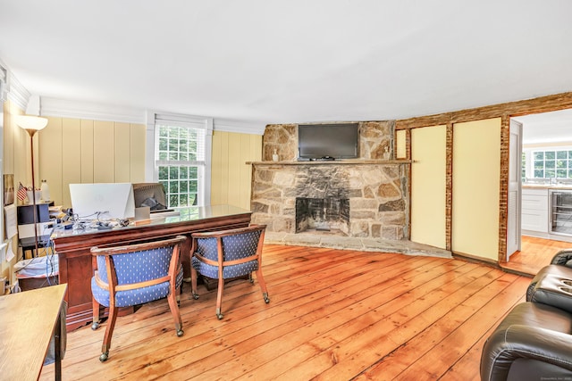 120 Huntington St, Shelton, CT 06484 - office space with wine cooler, wood-type flooring, a stone fireplace, and crown molding