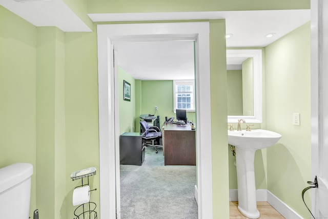 120 Huntington St, Shelton, CT 06484 - bathroom with toilet, baseboards, a sink, and recessed lighting