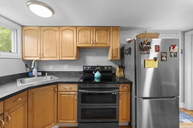 188 W Main St, East Lyme, CT 06357 - kitchen with appliances with stainless steel finishes and dark countertops
