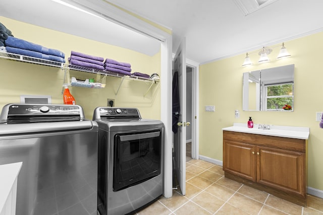 188 W Main St, East Lyme, CT 06357 - washroom featuring washing machine and clothes dryer and light tile patterned flooring