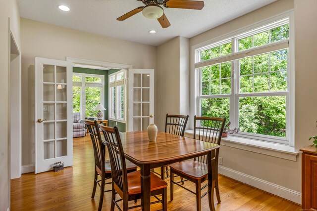 9 Benjamin Ln Unit 9, Tolland, CT 06084 - dining area featuring light wood-style flooring, ceiling fan, baseboards, recessed lighting, and french doors