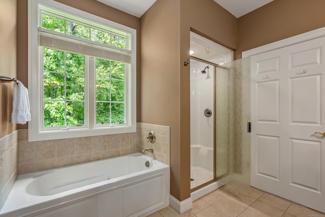 9 Benjamin Ln Unit 9, Tolland, CT 06084 - full bath with a shower stall, a bath, and tile patterned flooring