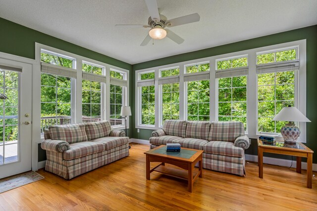 9 Benjamin Ln Unit 9, Tolland, CT 06084 - sunroom / solarium featuring french doors, a wooden deck, and wood finished floors