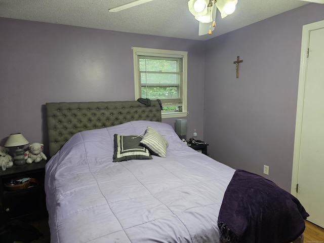 46 Richardson Hill Rd, Griswold, CT 06351 - bedroom featuring a ceiling fan and wood finished floors