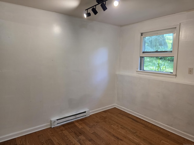 46 Richardson Hill Rd, Griswold, CT 06351 - unfurnished room with a baseboard radiator and wood finished floors