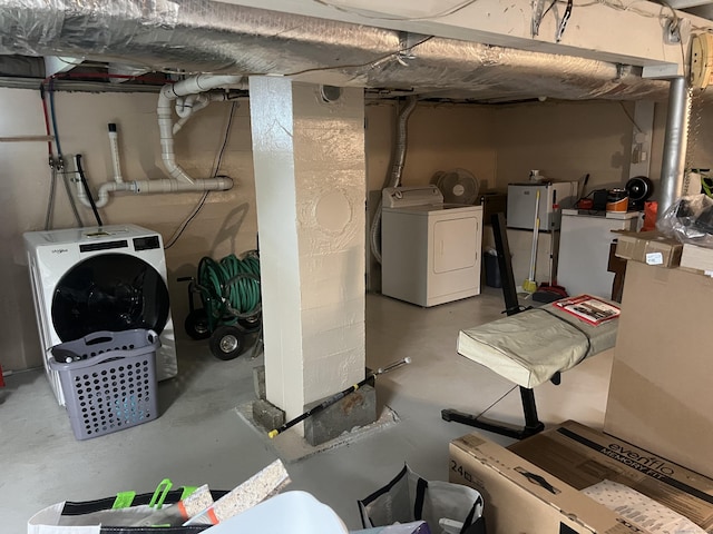 323 Harland Rd, Norwich, CT 06360 - unfinished basement featuring washing machine and dryer