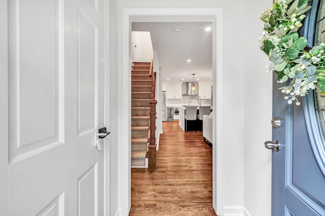 6 Buckboard Ln, Fairfield, CT 06824 - entryway featuring wood finished floors, stairway, and recessed lighting