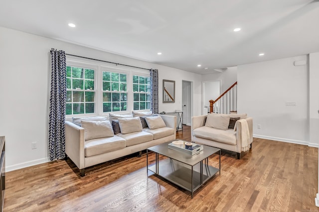 6 Buckboard Ln, Fairfield, CT 06824 - living room with wood finished floors, stairway, and recessed lighting