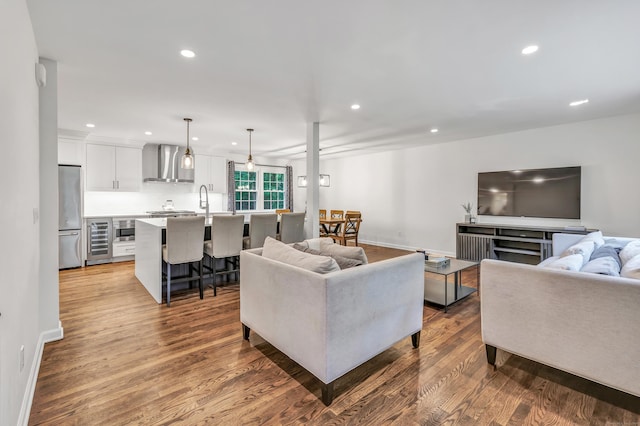 6 Buckboard Ln, Fairfield, CT 06824 - living room with wood finished floors, recessed lighting, and beverage cooler