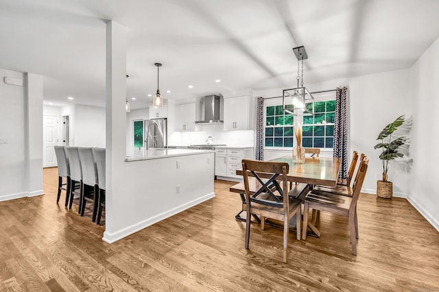 6 Buckboard Ln, Fairfield, CT 06824 - dining area with light wood-style floors, recessed lighting, and healthy amount of natural light