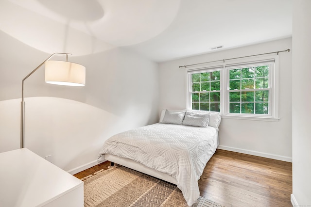 6 Buckboard Ln, Fairfield, CT 06824 - bedroom with baseboards and wood finished floors