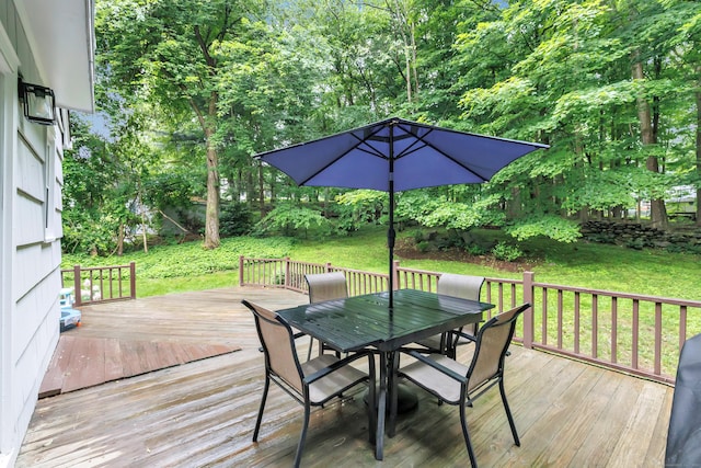 6 Buckboard Ln, Fairfield, CT 06824 - wooden terrace with outdoor dining space and a lawn
