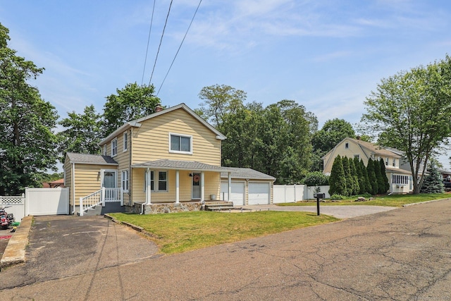 98 Herald Ave, Bridgeport, CT 06606 - view of front of home featuring driveway, a garage, covered porch, and a chimney