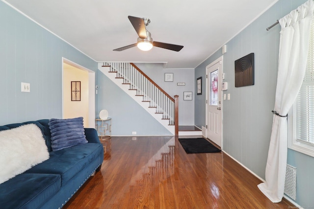 98 Herald Ave, Bridgeport, CT 06606 - entrance foyer with wood finished floors, stairs, ornamental molding, ceiling fan, and baseboards