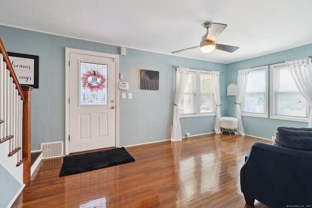 98 Herald Ave, Bridgeport, CT 06606 - foyer entrance with stairway, wood finished floors, ceiling fan, and baseboards