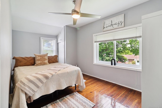 98 Herald Ave, Bridgeport, CT 06606 - bedroom with hardwood / wood-style floors, a ceiling fan, baseboards, and vaulted ceiling